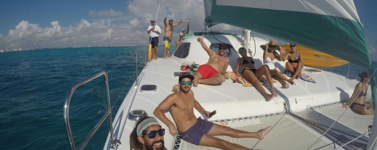 vYacth rentals in cancun private catamaran for ren on a private charter in the mexican caribbean puerto morelos puerto aventuras cancun isla mujeres snorkel tour Wild Cat 35 feet